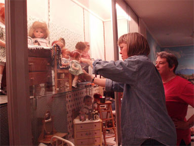 Debbie installing the exhibit at the Wenham Museum
